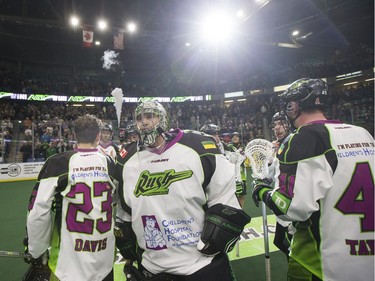Saskatchewan Rush goalie Aaron Bold and his teammates celebrate their win over the Toronto Rock in NLL action, March 26, 2016.