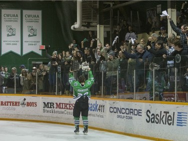 University of Saskatchewan Huskies forward Andrew Johnson celebrates after defeating the University of Alberta Golden Bears to win the CIS Men's Hockey Canada West championship on Saturday, March 5th, 2016.