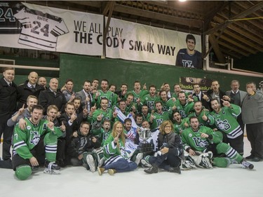 The University of Saskatchewan Huskies celebrate after defeating the University of Alberta Golden Bears to win the CIS Men's Hockey Canada West championship on Saturday, March 5th, 2016.