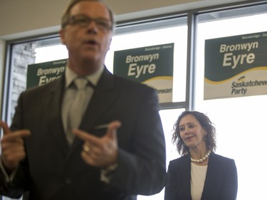 Bronwyn Eyre, Saskatchewan Party candidate Saskatoon Stonebridge-Dakota, looks on as Saskatchewan Premier Brad Wall speaks to campaign volunteers at the Saskatoon Stonebridge-Dakota Campaign Office on March 7, 2016. The Saskatoon Public School Division said it won't be holding a byelection, with discussions about who will be covering Eyre's duties in the lead up to the municipal election, set for Oct. 26.