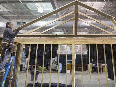 Reg (shown) and Tristan Amendt at the Royalty Construction booth promise to have this home built by the opening of the HomeStyles Home Show at Prairieland Park, March 9, 2016.