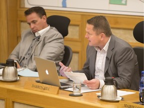 Coun. Darren Hill, right, questions comparing consultant costs from different cities when they may contain different services. Coun. Troy Davies says he expects more information from Saskatoon city hall staff regarding the $18.63 million the city spent on external consultants in 2015.