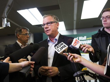 Premier Brad Wall addresses the media during the revealing of the Saskatchewan Party platform at their Southeast campaign office in Saskatoon, March 19, 2016.