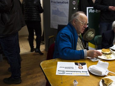 Supporters have lunch before the revealing of the Saskatchewan Party platform at their Southeast campaign office in Saskatoon, March 19, 2016.