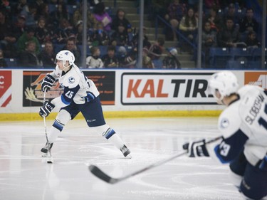 Saskatoon Blades' Libor Hajek hits the puck down ice during Saturday night's game at SaskTel Centre in Saskatoon where the Blades took home a 3-2 victory over the Prince Albert Raiders, March 19, 2016.