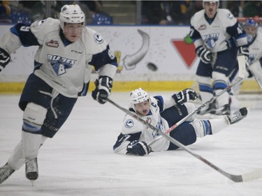 Saskatoon Blades' Nick Zajac falls down during Saturday night's game at SaskTel Centre in Saskatoon where the Blades took home a 3-2 victory over the Prince Albert Raiders, March 19, 2016.