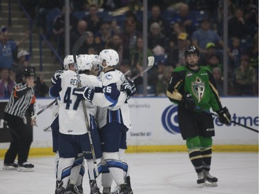 The Saskatoon Blades celebrate after a goal during Saturday night's game at SaskTel Centre in Saskatoon where the Blades took home a 3-2 victory over the Prince Albert Raiders, March 19, 2016.