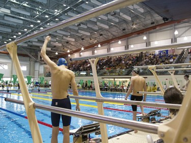 Swimmers prepare to race in the 200-metre boys freestyle during the 2016 Mansask Short Course Provincial Championship at Shaw Centre in Saskatoon, March 20, 2016.