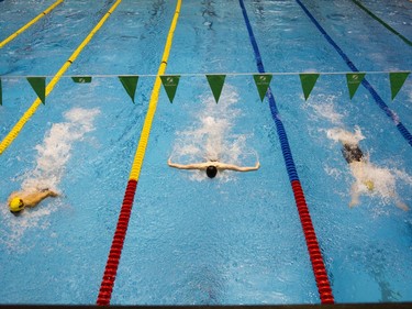 Swimmers race in the 50-Metre Boys Butterfly during the 2016 Mansask Short Course Provincial Championship at Shaw Centre in Saskatoon, March 20, 2016.