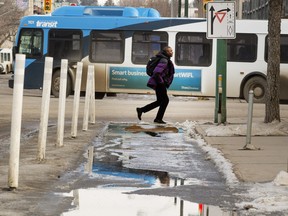 Clearing snow and cleaning dirt from Saskatoon's only protected bike lane cost more than the city expected, but staff are planning to go ahead with construction of a new bike lane on Fourth Avenue this summer.