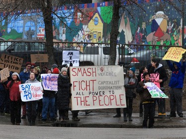 About 60 people gathered in Pleasant Hill Park to rally against the practice of police carding before marching to City Hall, March 15, 2016. Two police service members briefly visited the rally as well.