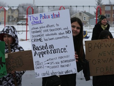 About 60 people gathered in Pleasant Hill Park to rally against the practice of police carding before marching to City Hall, March 15, 2016. Two police service members briefly visited the rally as well.