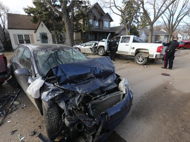 Saskatoon police responded to an early-morning crash at the 1200 block of 15th Street East on March 31, 2016, after a reports of a man crashing his vehicle into five parked vehicles and then fleeing the scene.