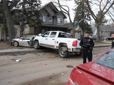 Saskatoon police responded to an early-morning crash at the 1200 block of 15th Street East on March 31, 2016, after a reports of a man crashing his vehicle into five parked vehicles and then fleeing the scene.