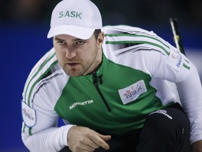 Saskatchewan skip Steve Laycock watches his shot during playoff curling action at the 2015 Brier in Calgary.