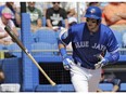 Toronto Blue Jays' Troy Tulowitzki flips his bat after drawing a walk from Minnesota Twins starting pitcher Tyler Duffey during the second inning of a spring training baseball game Tuesday, March 8, 2016, in Dunedin, Fla.