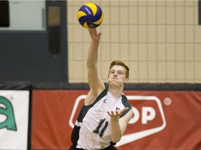 University of Saskatchewan Huskies setter CJ Gavlas, shown here serving against the University of Regina Cougars, was named the CIS rookie of the year Wedsnesday in Hamilton, where the Huskies are vying for a CIS national title. (Liam Richards/Saskatoon StarPhoenix)