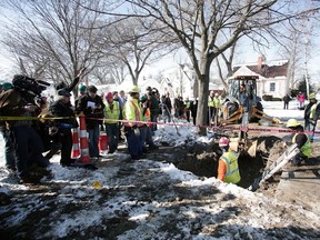 FLINT, MI - MARCH 4: City of Flint, Michigan workers prepare to replace a lead water service line pipe at the site of the first Flint home with high lead levels to have its lead service line replaced under the Mayor's Fast Start program,  on March 4, 2016 in Flint, Michigan. The program aims to replace all the lead water pipes in the city and will target homes in neighborhoods with the highest number of children under 6 years old, senior citizens, pregnant women and other high risk homes first.