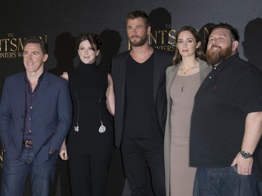 L-R: Rob Brydon, Alexandra Roach, Chris Hemsworth, Emily Blunt and Nick Frost pose for photographers at the photo call for "The Huntsman Winter's War" at a hotel in London, England, March 31, 2016.