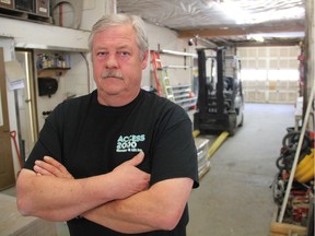 Andy Ogilvy, who co-owns Access 2000 Elevator & Lift Inc., which neighbours the site of the fire, says he's concerned about the long-term implications of a scrap yard fire that occurred on Saskatoon's west side on April 19, 2016. (Morgan Modjeski/The Saskatoon StarPhoenix)