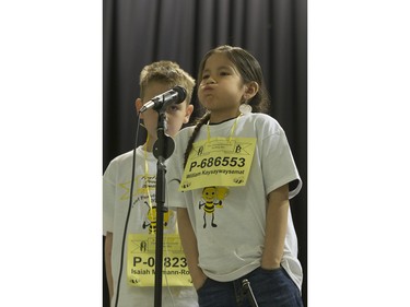 Isaiah McMann-Ross (L) and William Kaysaywaysemat compete in the finals of the Primary competition of the first ever First Nations Provincial Spelling Bee at the Don Ross Centre in North Battleford, April 8, 2016. Kaysaywaysemat moves on to take first place and win.