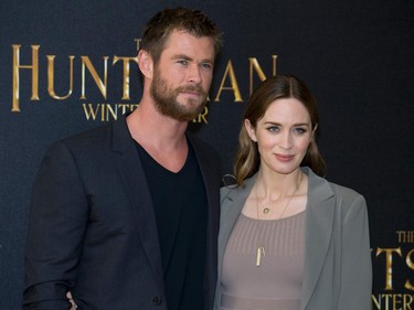 Actors Chris Hemsworth and Emily Blunt pose for pictures at a photo call to promote "The Huntsman: Winter's War" in London, England, March 31, 2016.