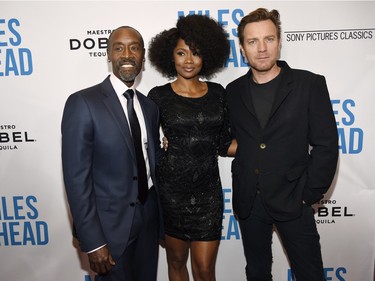 L-R: Don Cheadle, Emayatzy Corinealdi and Ewan McGregor at the premiere of "Miles Ahead" at the Writers Guild Theatre, March 29, 2016 in Beverly Hills, California.