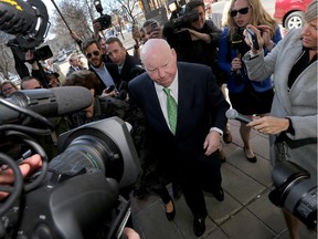 Sen. Mike Duffy arrives at the Ottawa court house on April 21, 2016