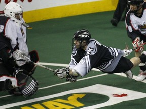 Edmonton Rush Jimmy Quinlan can't get the ball past Calgary Roughnecks Pat Campbell in the first quarter of their NLL game on April 11, 2009 at Rexall Place in Edmonton.