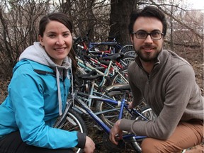 Erin Akins, sustainability initiatives coordinator at the University of Saskatchewan's office of sustainability, left, can be seen with Matt Wolsfeld, the office's community engagement coordinator amongst bicycles that have been collected and tagged after they were left on the University of Saskatchewan to rot. As part of a program on the U of S campus, the bikes will be turned over to several charitable organizations in the city, with the majority going to the Bridge City Bike Co-op to be reconstructed and reused. (Morgan Modjeski/The Saskatoon StarPhoenix)