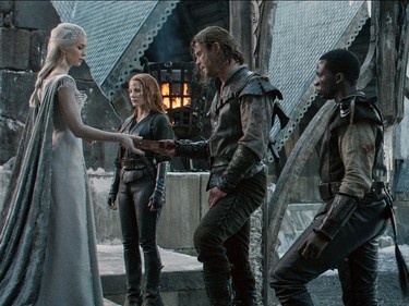 L-R: Emily Blunt as Queen Freya, Jessica Chastain as Sara, Chris Hemsworth as Eric the Huntsman and Sope Dirisu as Tull in "The Huntsman: Winter's War."