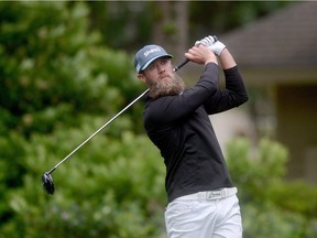 Graham DeLaet tees off on the eighth hole during the second round of the RBC Heritage golf tournament in Hilton Head Island, S.C. Friday, April 15, 2016. DeLaet's beard care routine is nearly as precise as his pre-shot routine these days, as the 34-year-old golfer's facial hair has quickly become the talk of the PGA Tour.