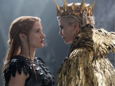 Jessica Chastain (L) and Charlize Theron star in "The Huntsman: Winter's War."