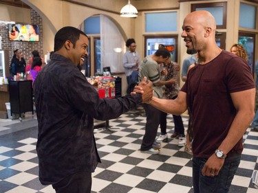 Ice Cube (L) and Common star in "Barbershop: The Next Cut."