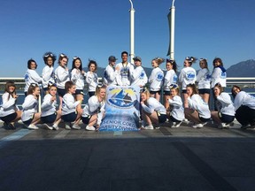 John Paul II Crusaders with their Sea to Sky International Cheerleading Championship banner from this weekend's competition.