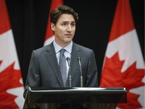 Prime Minister Justin Trudeau makes a statement to the media in Kananaskis, Alta., about the killing of John Ridsdel,