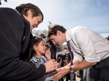 Prime Minister Justin Trudeau greets people while visiting the YWCA Trade Journey Program at Saskatchewan Polytechnic in Saskatoon, April 27, 2016.