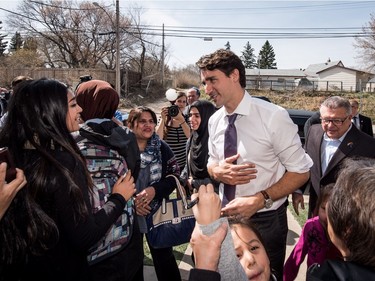 Prime Minister Justin Trudeau greets people while visiting the YWCA Trade Journey Program at Saskatchewan Polytechnic in Saskatoon, April 27, 2016.