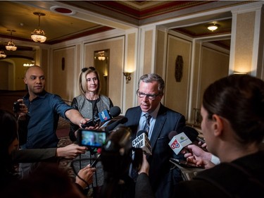 Saskatchewan Premier Brad Wall addresses press after meeting with Prime Minister Justin Trudeau in Saskatoon, April 27, 2016.