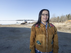 Lac La Ronge Indian Band Chief Tammy Cook-Searson stands near Lac La Ronge.