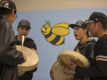 Drummers play the honour song during the introduction of the first ever First Nations Provincial Spelling Bee at the Don Ross Centre in North Battleford, April 8, 2016.