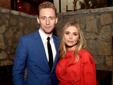 Actors Tom Hiddleston (L) and Elizabeth Olsen pose at the after party for the premiere of Sony Pictures Classic's "I Saw The Light" at Sadie's Kitchen on March 22, 2016 in Los Angeles, California.