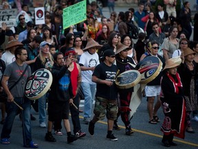 Protesters in Vancouver march in opposition to the Northern Gateway pipeline in 2014.