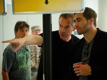 Quebec director Jean-Marc Vallée (C) and actor Jake Gyllenhaal on the set of "Demolition."