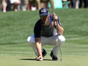 Graham DeLaet lines up his putt on the eighth green during the third round of the 2016 RBC Heritage at Harbour Town Golf Links on April 16, 2016 in Hilton Head Island, South Carolina.