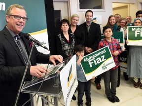 Premier Brad Wall speaking during a campaign stop at Muhammad Fiaz's headquarters in Regina.