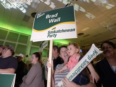 Saskatchewan Party supporters 11-month-old Zoey Graham and her grandma Kathy Pratt cheer as results come in at the Palliser Pavilion in Brad Wall's home riding of Swift Current after his third election win in Saskatchewan, April 4, 2016.