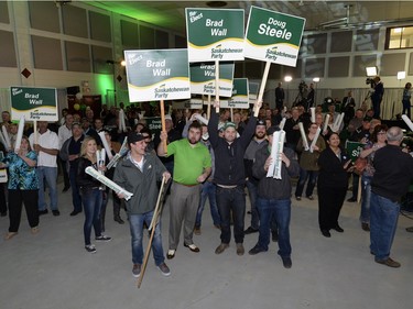 Saskatchewan Party supporters cheer as results come in at the Palliser Pavilion in Brad Wall's home riding of Swift Current after his third election win in Saskatchewan, April 4, 2016.