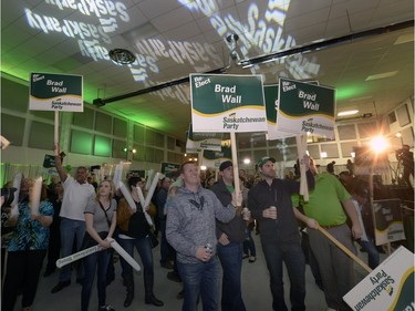 Saskatchewan Party supporters cheer as results come in at the Palliser Pavilion in Brad Wall's home riding of Swift Current after his third election win in Saskatchewan, April 6, 2016.