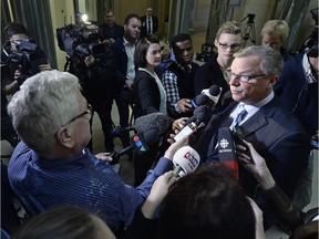 Premier Brad Wall speaks to reporters at the Saskatchewan Legislature the morning after the Saskatchewan Party won its third term governing the province